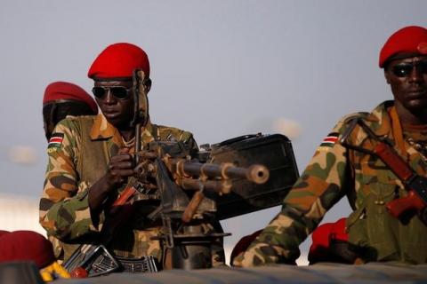 SPLA soldiers stand in a vehicle in Juba, South Sudan. PHOTO BY REUTERS/Goran Tomasevic