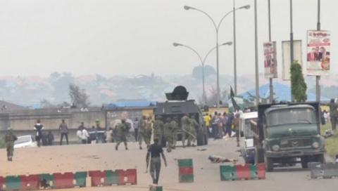 Soldiers behind moving armored vehicle advancing on Islamic Movement of Nigeria protesters are seen in this still image taken from a video shot on October 29, 2018 on the outskirts of Abuja, Nigeria. PHOTO BY REUTERS