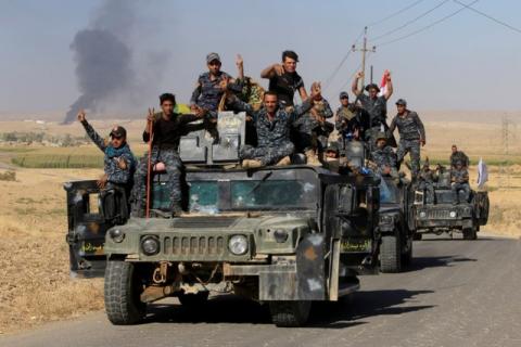 Members of Iraqi federal forces gather in Dibis area, on the outskirts of Kirkuk, Iraq, October 17, 2017. PHOTO BY REUTERS/Alaa Al-Marjani