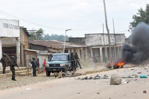 Congolese soldiers from the Armed Forces of the Democratic Republic of Congo (FARDC) patrol the streets following an attack by suspected Islamist rebels who killed at least 11 civilians in Beni, Democratic Republic of Congo, March 28, 2018. PHOTO BY REUTERS/Stringer