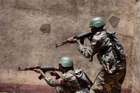 Malian soldiers take position during training in urban combat conducted by the European Union training mission in Koulikoro. PHOTO BY REUTERS/Joe Penney