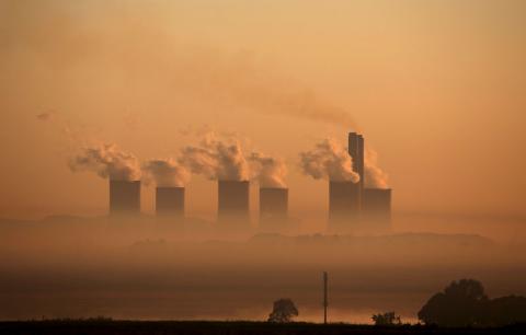 Steam rises at sunrise from the Lethabo Power Station, a coal-fired power station owned by state power utility ESKOM near Sasolburg, South Africa, March 2, 2016. PHOTO BY REUTERS/Siphiwe Sibeko