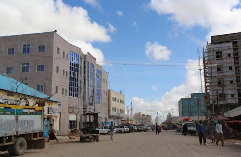 A general view shows people walking along a street in Galkayo, a city divided between the semi-autonomous regions of Puntland and Galmudug, in central Somalia, April 21, 2015. PHOTO BY REUTERS/Feisal Omar