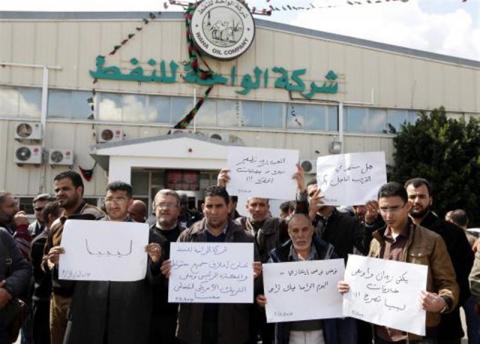 Staff at Libya's Waha Oil Company go on strike to protest against the sale of oil to a North Korean-flagged tanker at the Es Sider port, in Tripoli