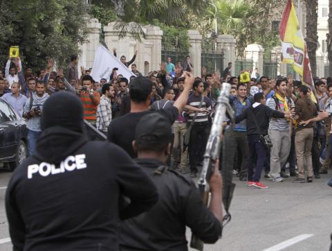 Students of Cairo University, who are supporters of the Muslim Brotherhood and ousted Egyptian President Mohamed Mursi, shout slogans