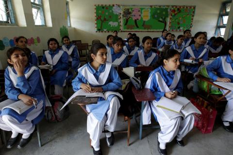 Students listen to their teacher during a lesson at the Islamabad College for girls in Islamabad, Pakistan, October 13, 2017. PHOTO BY REUTERS/Caren Firouz