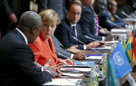 (L-R) Ghana's President John Dramani Mahama, German Chancellor Angela Merkel and French President Francois Hollande attend the Valletta Summit on Migration in Valletta, Malta, November 11, 2015. PHOTO BY REUTERS/Yves Herman