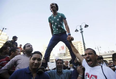 Supporters of ousted President Mursi shout slogans