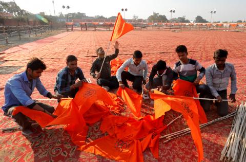 Supporters of the Vishva Hindu Parishad (VHP), a Hindu nationalist organisation, prepare flags at the venue of Sunday's "Dharma Sabha" or a religious congregation organised by VHP, in Ayodhya, Uttar Pradesh, India, November 24, 2018. PHOTO BY REUTERS/Pawan Kumar