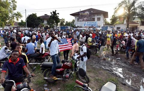 Supporters of Congolese main opposition party the Union for Democracy and Social Progress (UDPS) gather outside the party's headquarters in Kinshasa, Democratic Republic of Congo, January 9, 2019. PHOTO BY REUTERS/Olivia Acland