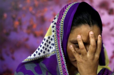 A survivor of slavery who wished to remain anonymous poses for a picture in New Delhi, India, March 7, 2018. PHOTO BY REUTERS/Cathal McNaughton