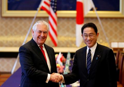 U.S. Secretary of State Rex Tillerson (L) shakes hands with Japan's Foreign Minister Fumio Kishida before their meeting at the foreign ministry's Iikura guest house in Tokyo, Japan, March 16, 2017. PHOTO BY REUTERS/Toru Hanai