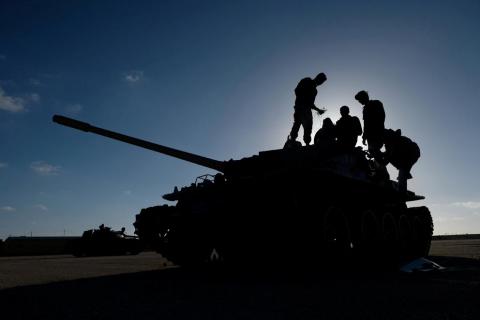 Members of Libyan National Army (LNA) commanded by Khalifa Haftar, get ready before heading out of Benghazi to reinforce the troops advancing to Tripoli, in Benghazi, Libya April 13, 2019. REUTERS/Esam Omran Al-Fetori/