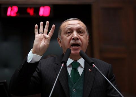 Turkish President Tayyip Erdogan addresses members of parliament from his ruling AK Party (AKP) during a meeting at the Parliament in Ankara, Turkey, November 7, 2017. PHOTO BY REUTERS/Umit Bektas