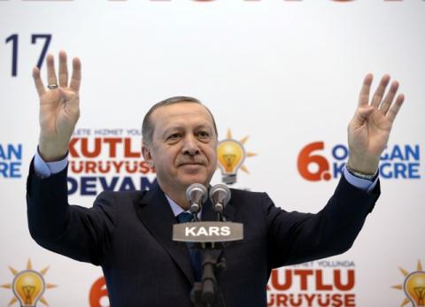 Turkish President Tayyip Erdogan greets his supporters during a meeting of his ruling AK Party in Kars, Turkey, December 2, 2017. PHOTO BY REUTERS/Yasin Bulbul/Presidential Palace