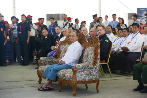 Myanmar President Thein Sein (C) watches a presentation on the Solar Impulse 2, a solar-powered plane attempting a flight around the world, at Mandalay international airport, March 20, 2015. PHOTO BY REUTERS/Soe Zeya Tun