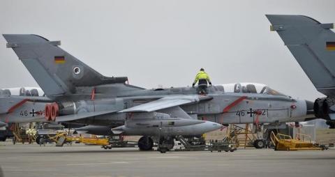 A technician works on a German Tornado jet at the air base in Incirlik, Turkey, January 21, 2016. PHOTO BY REUTERS/Tobias Schwarz