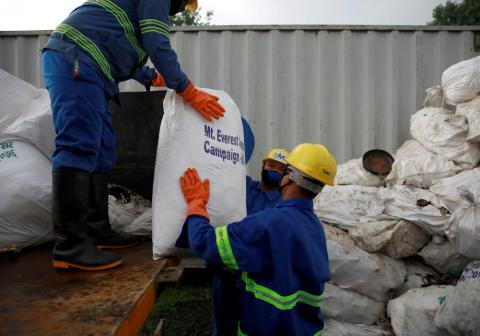 Workers from a recycling company load the garbage collected and brought from Mount Everest in Kathmandu, Nepal, June 5, 2019. PHOTO BY REUTERS/Navesh Chitrakar