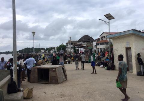 Travellers are seen gathered at the Lamu jetty following an attack by Somalia's Islamist group al Shabaab on a military base in Manda, Lamu, Kenya, January 5, 2020. PHOTO BY REUTERS/Abdalla Barghash