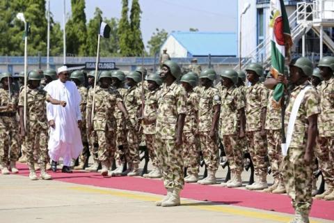 Nigerian President Muhammadu Buhari inspects a guard of honour during his visit to Nigerian troops in Yola, Adamawa, Nigeria, November 13, 2015. PHOTO BY REUTERS/Stringer