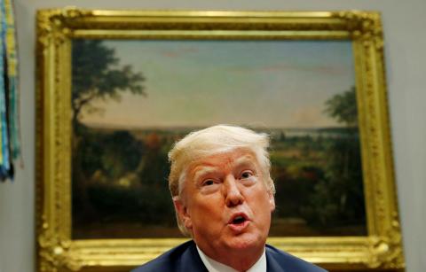 U.S. President Donald Trump answers questions from the news media during an event at which he announced a grant for a drug-free communities support program in the Roosevelt Room of the White House in Washington, U.S., August 29, 2018. PHOTO BY REUTERS/Leah Millis