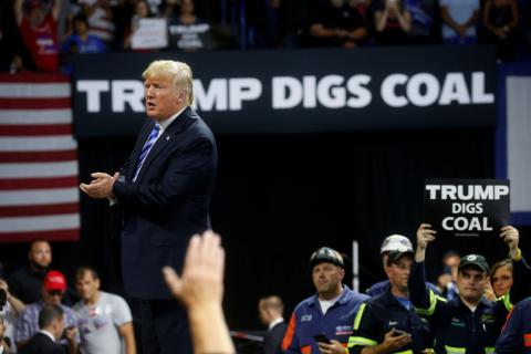 U.S. President Donald Trump acknowledges coal miners during a Make America Great Again rally at the Civic Center in Charleston, West Virginia, August 21, 2018. PHOTO BY REUTERS/Leah Millis