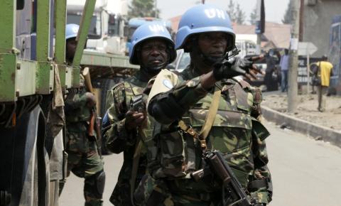 U.N. peacekeepers from Tanzania patrol near the border crossing point between Rwanda and the Democratic Republic of Congo in Goma