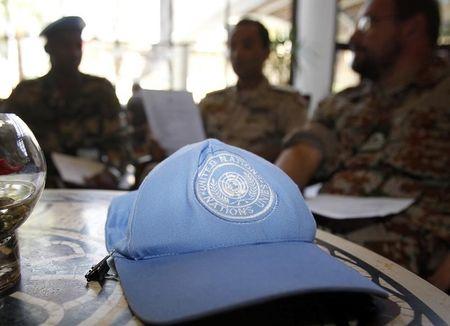 A blue United Nations cap is left near members of the U.N. observers mission in Syria, who have left their bases in the province of Homs in Central Syria, as they check their departure dates in a hotel in Damascus, August 20, 2012. PHOTO BY REUTERS/Khaled al-Hariri