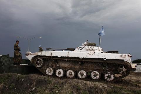 United Nations peacekeepers guard a United Nations base in Malakal, July 23, 2014. PHOTO BY REUTERS/Andreea Campeanu