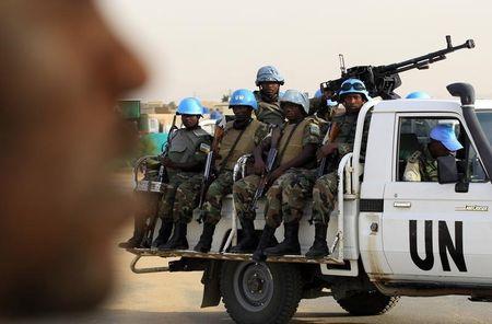 UNAMID peacekeepers patrol as a delegation of Ambassadors of European Union to Sudan visits a women development program centre funded by World Food Programme (WFP) at Shagra village in North Darfur, October 18, 2012. PHOTO BY REUTERS/Mohamed Nureldin Abdallah