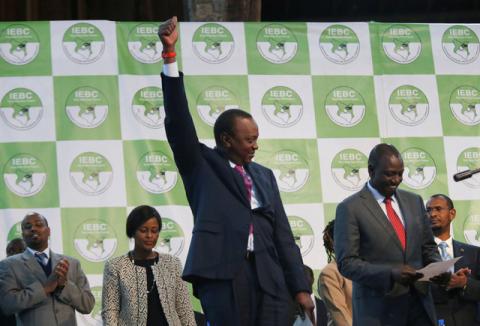 ncumbent President Uhuru Kenyatta reacts after he was announced winner of the presidential election at the IEBC National Tallying centre at the Bomas of Kenya, in Nairobi, Kenya August 11, 2017. With him is Deputy President William Ruto. PHOTO BY REUTERS/Thomas Mukoya