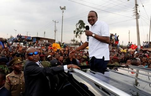 Kenya's President Uhuru Kenyatta addresses his supporters at Burma market after his election win was declared invalid by the Supreme Court in Nairobi, Kenya, September 1, 2017. PHOTO BY REUTERS/Thomas Mukoya