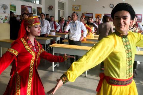 Residents at the Kashgar city vocational educational training centre dance for visiting reporters and officials in a classroom during a government organised visit in Kashgar, Xinjiang Uighur Autonomous Region, China, January 4, 2019. PHOTO BY REUTERS/Ben Blanchard