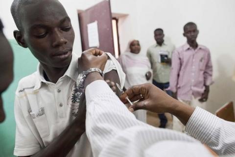 Staff members of Teaching Hospital receive the first vaccination treatment for yellow fever in El Geneina, West Darfur, November 14, 2012. PHOTO BY REUTERS/Albert Gonzalez Farran