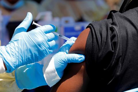 A health worker injects a man with Ebola vaccine in Goma, Democratic Republic of Congo, August 5, 2019. PHOTO BY REUTERS/Baz Ratner