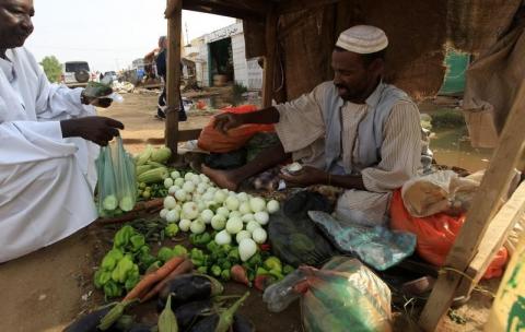 A vendor sells vegetables during Ramadan at a local market in north Khartoum, August 3, 2012. PHOTO BY REUTERS/Mohamed Nureldin Abdallah