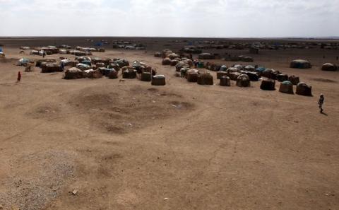 A small village is seen at a distance in Farado Kebele, one of drought stricken Somali region in Ethiopia, January 26, 2016. PHOTO BY REUTERS/Tiksa Negeri