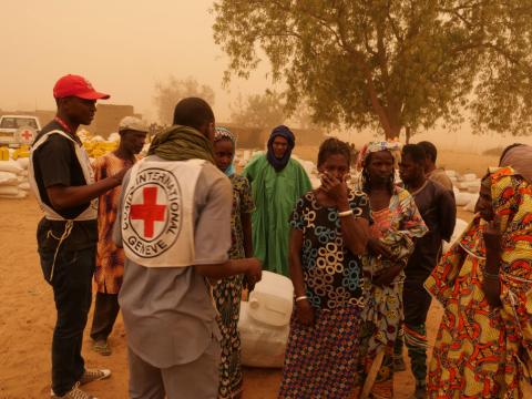 Villagers are seen following the March 23 attack by militiamen that killed about 160 Fulani people. PHOTO BY REUTERS/ICRC 