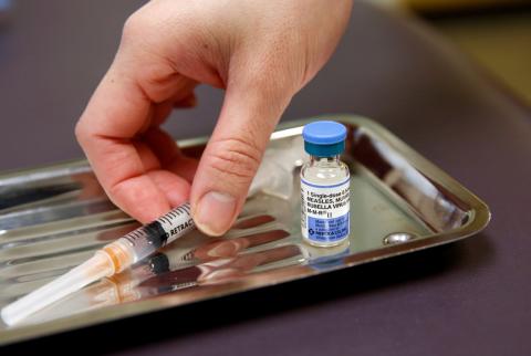 A vial of the measles, mumps, and rubella virus (MMR) vaccine is pictured at the International Community Health Services clinic in Seattle, Washington, U.S., March 20, 2019. PHOTO BY REUTERS/Lindsey Wasson