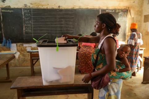 A woman casts her vote at a polling station during the presidential election in Lome, Togo, February 22, 2020. PHOTO BY REUTERS/Luc Gnago