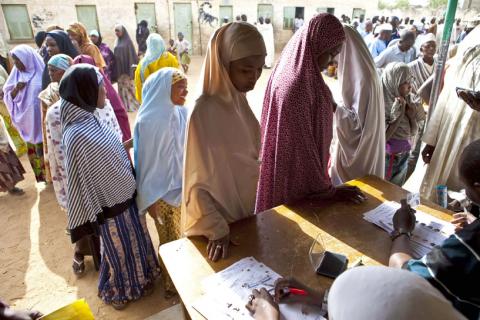 Women queue to cast their ballots in Nigeria's parliamentary elections in the northern city of Kano, April 9, 2011. Nigerians turned out for a delayed parliamentary election on Saturday, voicing determination to hold a credible vote in Africa's most populous nation despite chaotic organisation and violence. PHOTO BY REUTERS/Joseph Penney