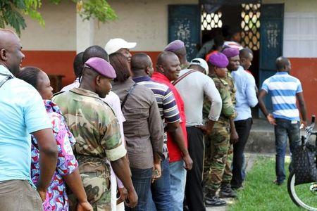 Military personnel vote at a polling station in Brazzaville, Congo, October 25, 2015. PHOTO BY REUTERS/Roch Baku