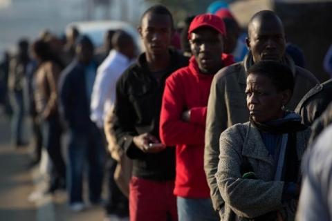 Locals queue to cast their votes during the Local Government elections in Diepsloot township, north of Johannesburg, South Africa, August 3, 2016. PHOTO BY REUTERS/James Oatway