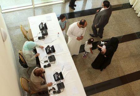 Egyptians living abroad register their information to cast their vote during the first stage of Egypt's parliamentary election, at the Egyptian embassy in Doha, Qatar October 17, 2015. The elections, continuing through to December, will produce Egypt's first elected parliament since June 2012. PHOTO BY REUTERS/Naseem Zeitoon