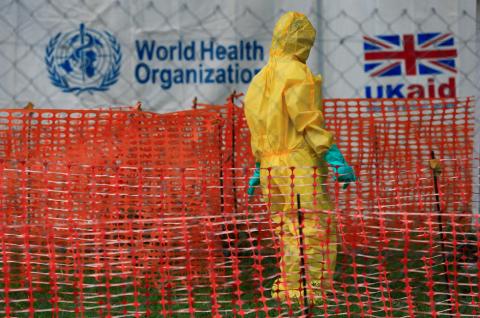 A person dressed in ebola protective apparel is seen inside an ebola care facility at the Bwera general hospital near the border with the Democratic Republic of Congo in Bwera, Uganda, June 14, 2019. PHOTO BY REUTERS/James Akena