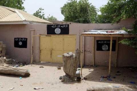 A wall painted by Boko Haram is seen in Damask, March 24, 2015. PHOTO BY REUTERS/Joe Penney