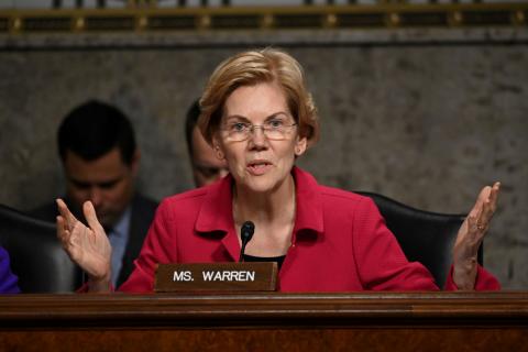 Democratic 2020 U.S. presidential candidate and U.S. Senator Elizabeth Warren (D-MA) arrives a Senate Banking and Housing and Urban Affairs Committee hearing on "The Semiannual Monetary Policy Report to Congress" on Capitol Hill in Washington, U.S., February 26, 2019. PHOTO BY REUTERS/Jim Young