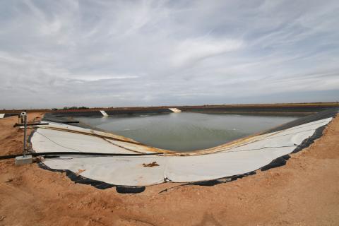 BIG SPRING, Texas (Reuters) - Mike Christensen strides among rows of gleaming steel tanks, pointing to pipelines that arrive from miles around to this corner of former farmland near Midland, Texas, the heart of the largest oil patch in the United States.  His company is one of dozens opening sites like this one that handles, not the lucrative oil, but the shale industry's dirty secret: wastewater.  While U.S. oil production has reached record levels on account of the shale revolution of the last decade, muc