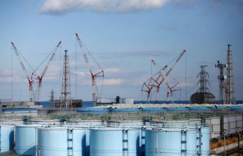 The reactor units No.1 to 4 are seen over storage tanks for radioactive water at Tokyo Electric Power Co's (TEPCO) tsunami-crippled Fukushima Daiichi nuclear power plant in Okuma town, Fukushima prefecture, Japan, February 18, 2019. PHOTO BY REUTERS/Issei Kato