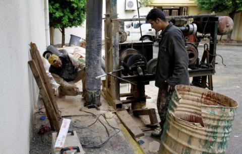 Workers dig a water well in Tripoli, Libya, October 25, 2017. PHOTO BY REUTERS/Ismail Zitouny